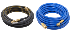 A black roll and a blue roll of pneumatic hoses with brass fittings