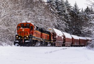 BNSF locomotive traveling through the snow