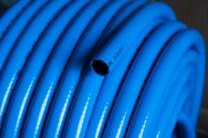 Roll of blue pneumatic hose