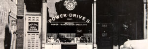 Black and White Photo of power Drives, Inc. Storefront