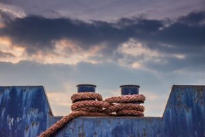 side of ship with ropes