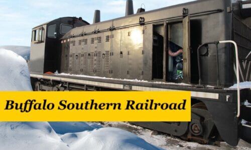 locomotive with PowerHouse on board and Buffalo Southern Railroad banner